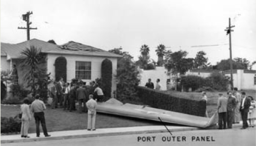 The left outer wing panel of PB4Y-2 Bu. No. 59554 struck the roof of the residence at 3121 Kingsley Street, Loma Portal, San Diego. It came to rest in the front yard. (U.S. Navy)