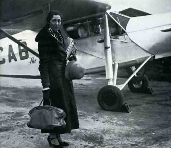 Amy Johnson Mollison with her de Havilland DH.80A Puss Moth, G-ACAB, Desert Cloud, London, 14 November 1932. (Unattributed)