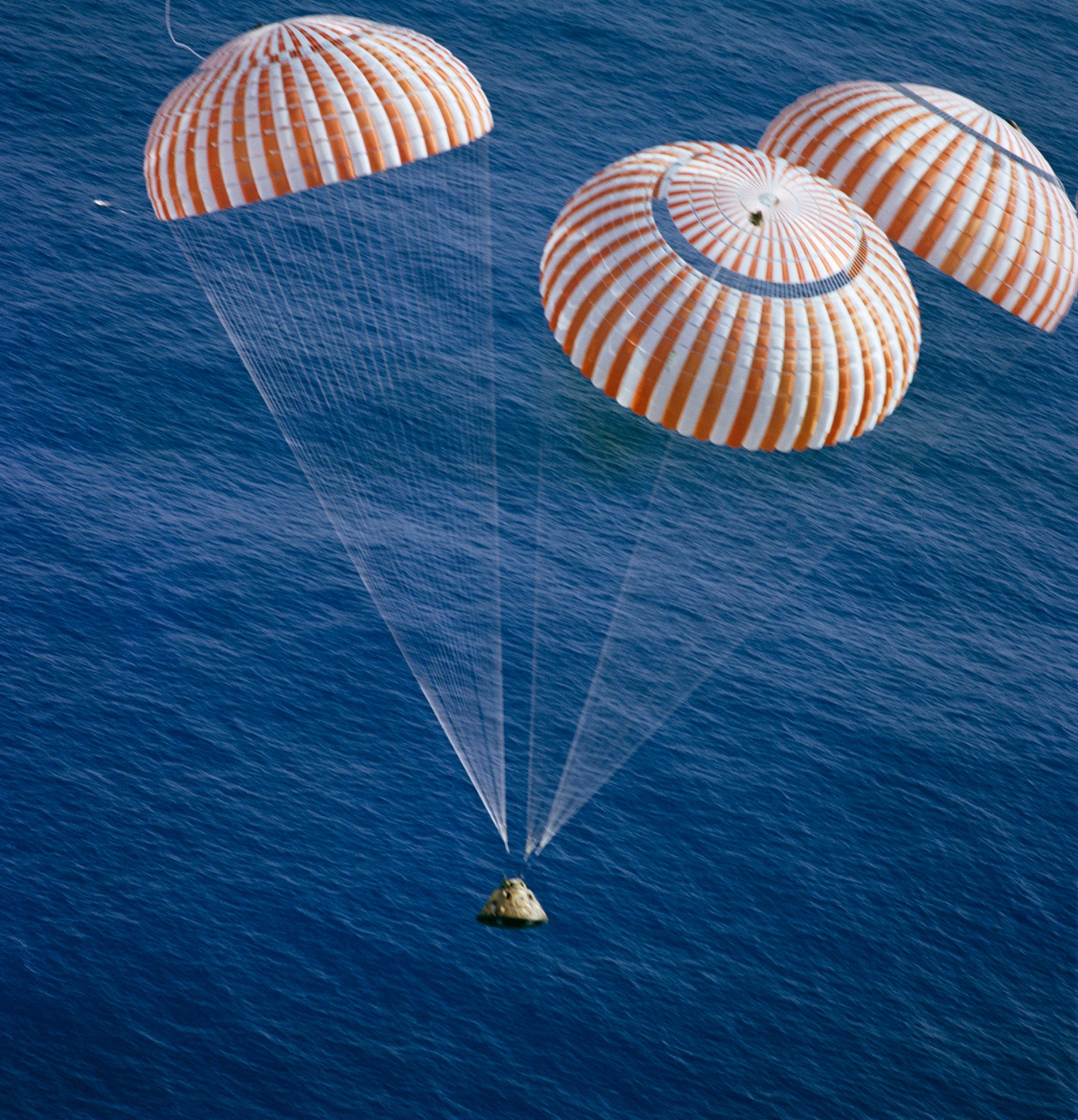 The Apollo 17 command module America (CM-112) descends to the South Pacific under three parachutes. (NASA)