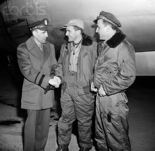 General Reuben C. Hood congratulates Captain Glen Edwards and Lieutenant Colonel Harold E. Warden after their record-setting transcontinental flight, 8 December 1945. ( © Bettman/CORBIS.) 