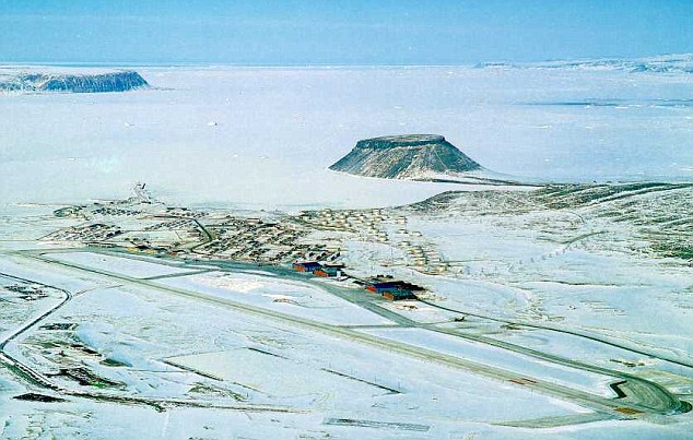 Thule Air Base, Greenland. Mount Dundas is the flat-topped mountain just right of the center of the image. Saunders Island is in the distance. Hobo 28 crashed into North Star Bay, covered with sea ice in this photograph.