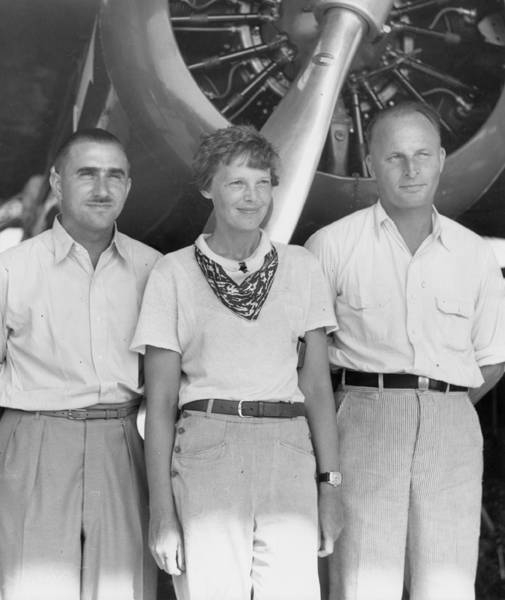 Paul Mantz, Amelia Earhart and Lockheed's chief pilot, Marshall E. Headle, with Earhart's Model 10E Electra Speical. (Courtesy of neil Corbett, Test and Research Pilots, Flight Test Engineers) 