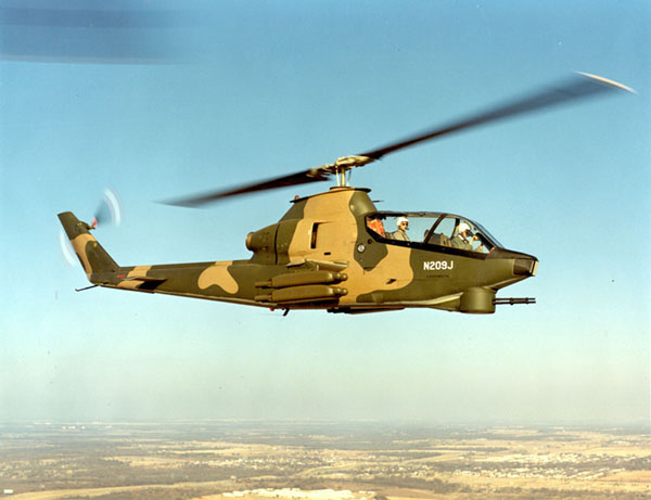 N209J,the Bell Model 209 prototype, shown in camouflage colors. (Bell Helicopter Company)