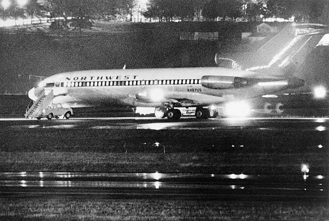 This photograph shows Northwest Orient Airlines' Boeing 727, N467US, on teh ramp at Seattle-Tacoma International Airport on the evening of 24 November 1971. (Unattributed; probable news agency photo)