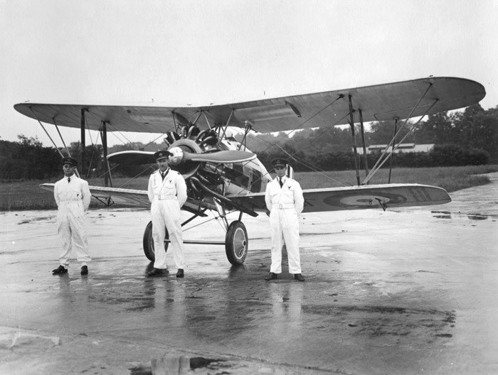 Left to right, Pilot Officer Douglas R.S. Bader, Flight Lieutenant Harry Day and Flying Officer Geoffrey Stephenson during training for the 1932 Hendon Airshow, with a Bristol Bulldog. (RAF Museum)