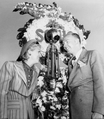 Jackie Cochran and William P. Odom with the Sohio Race trophy. (Unattributed)