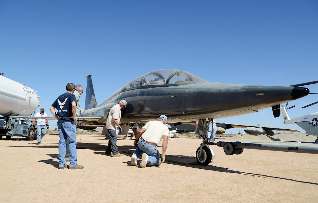 A team of volunteers place Northrop T-38A Talon 61-0849 in position at teh outdorr dsiplay area of the Air Force Flight Test Museum, Edwards Air force Base, California. (Rebecca Amber/U.S. Air Force)