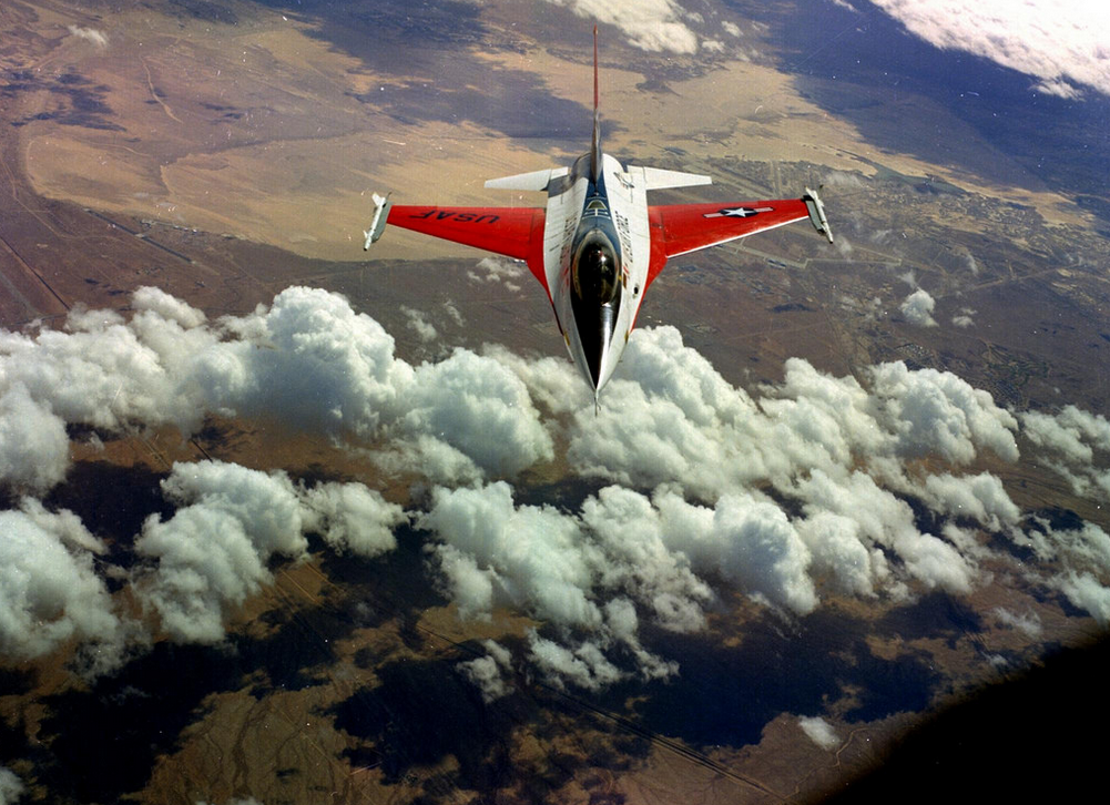 A prototype YF-16 during a test flight, March 1973. Edwards Air Force Base is visible under the airplane's left wing. (Lockheed Martin)