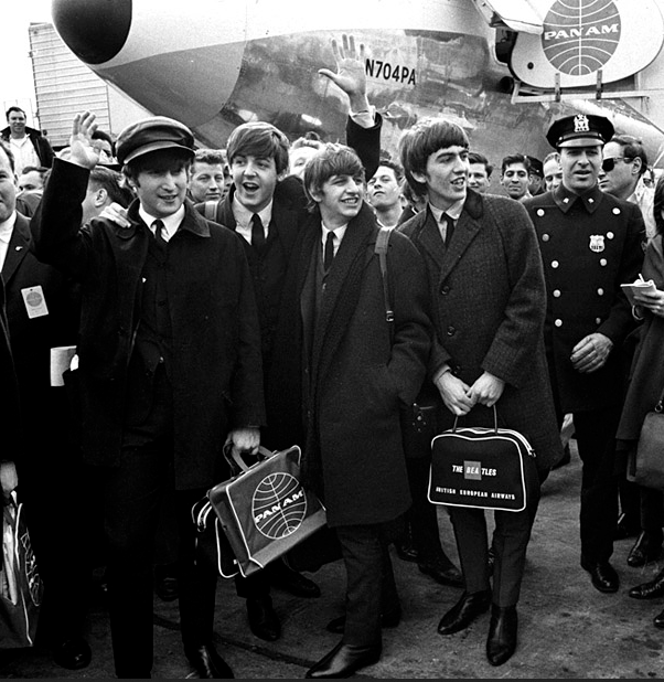 The Beatles arrival at New York, 7 February 1964. N704PA is the airliner in the background.