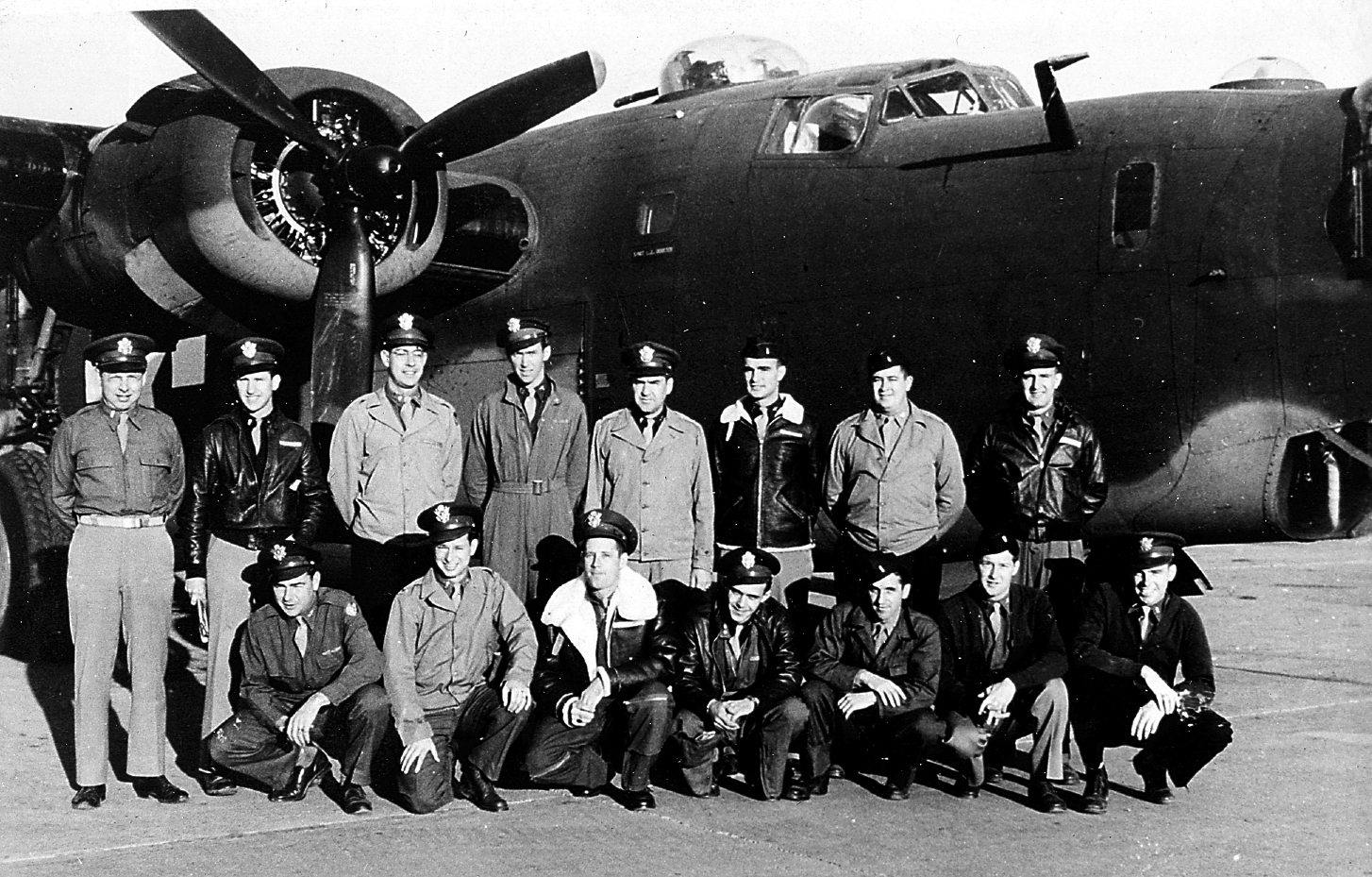 Captain James M. Stewart, USAAF, (standing, fourth from left) commanding officer, 703rd Bombardment Squadron (Heavy), 445th Bombardment Group (Heavy), with his squadron officers and a B-24 Liberator long-range heavy bomber, 1943. (U.S. Air Force)