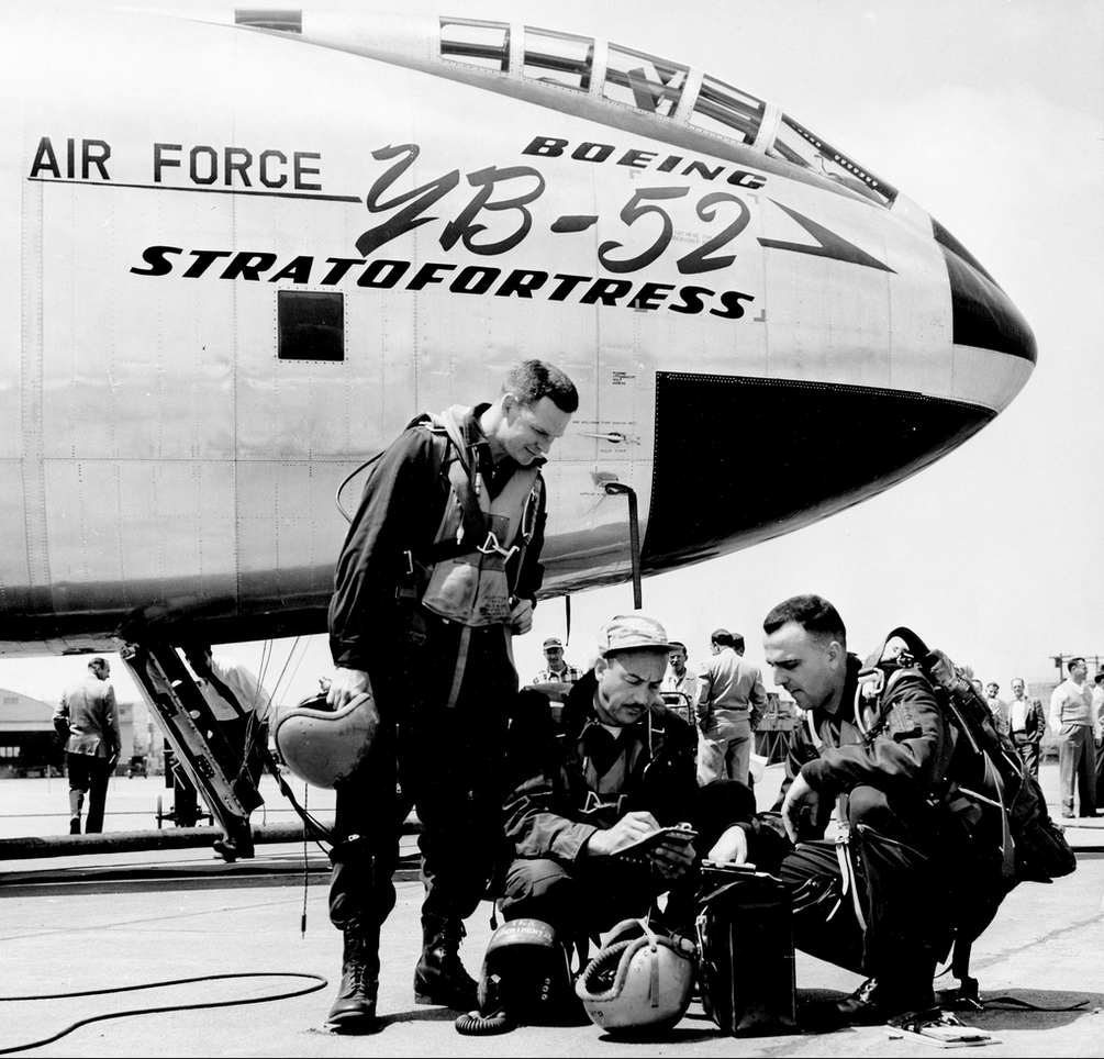 Captain William Magruder (standing) Boeing Chief Test Pilot Alvin M. Johnston (center) and Lieutenant Colonel Guy M. Townsend with the Boeing YB-52 Stratofortress 49-231. (Boeing)