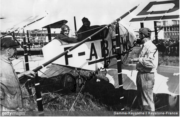 On 1 April 1921 in Santiago, French pilot Adrienne BOLLAND on board her Caudron G-3 after she succeeded in crossing the Andes. It is a signed photo: the pilot's signature is at the centre. (Getty Images/Keystone France)