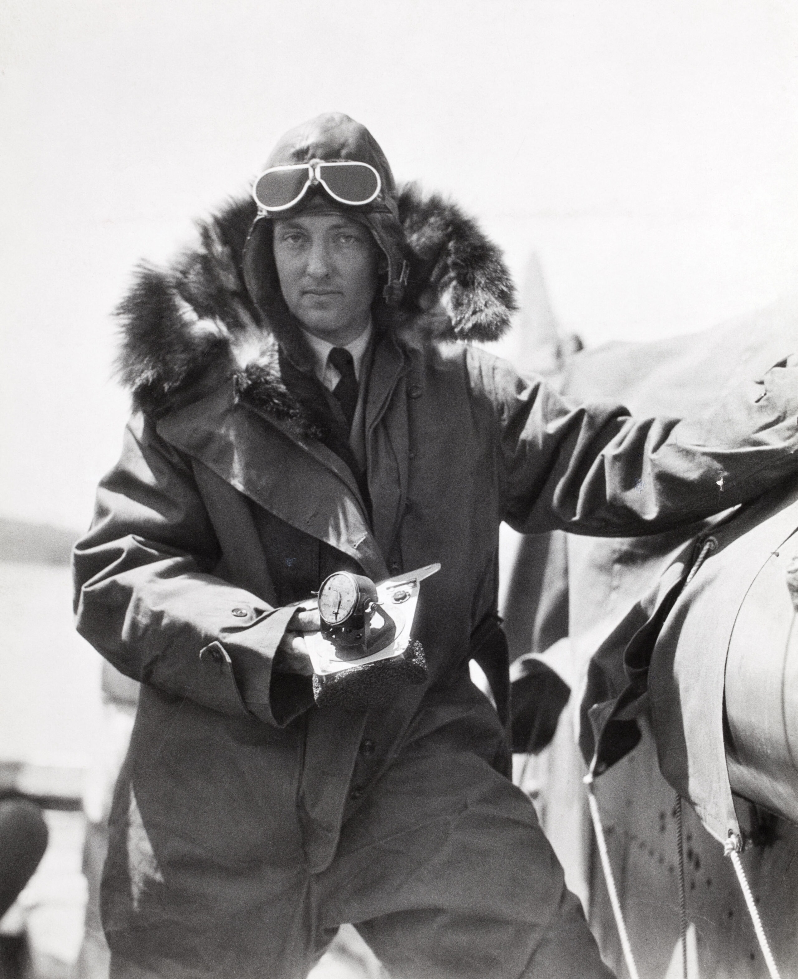 Richard E. Byrd holding a Bumstead Sun Compass used for celestial navigation at very high latitudes, 1925. (Maynard Owen Williams/National Geographic Society, Image ID 612617)