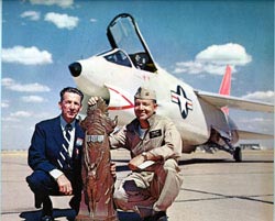 Commander Robert W. Windsor, Jr., U.S. Navy (right) with the Thompson Trophy. (Vought Aircraft)