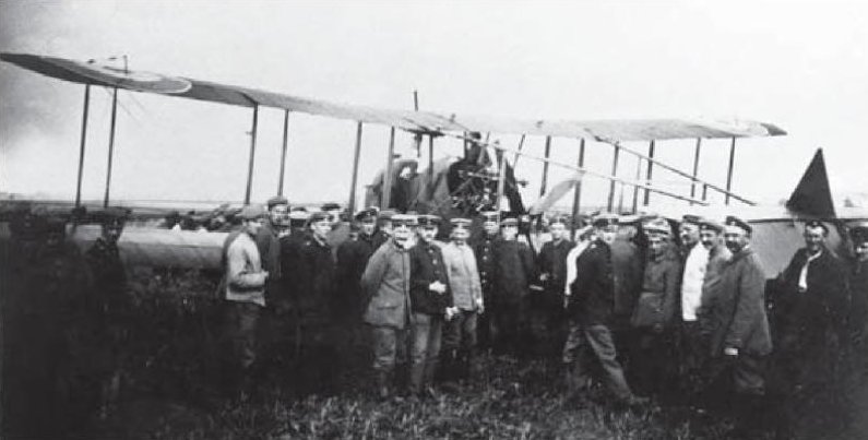 Morris and Rees flew this Royal Aircraft Factory F.E. 2B, serial number 7018, shown surrounded by enemy soldiers. (Unattributed)