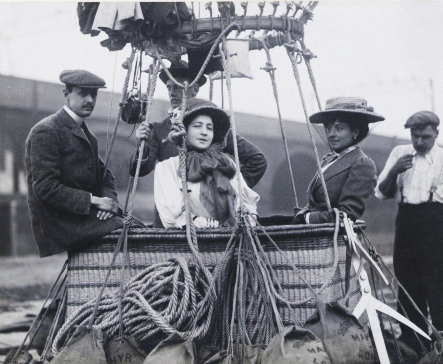 Frank Hedges butler (left, Vera Butler (center, and Charles Stewart Rolls (center, rear)