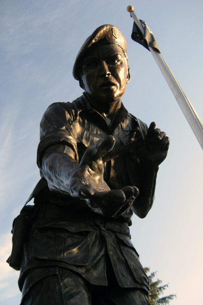 "That Others May Live." Bronze sculpture of Sergeant Larry Wayne Maysey, United States Air Force, by Wayne Hyde. The memorial is located on Main Street, Borough of Chester, New Jersey. (© Sheena Chi)