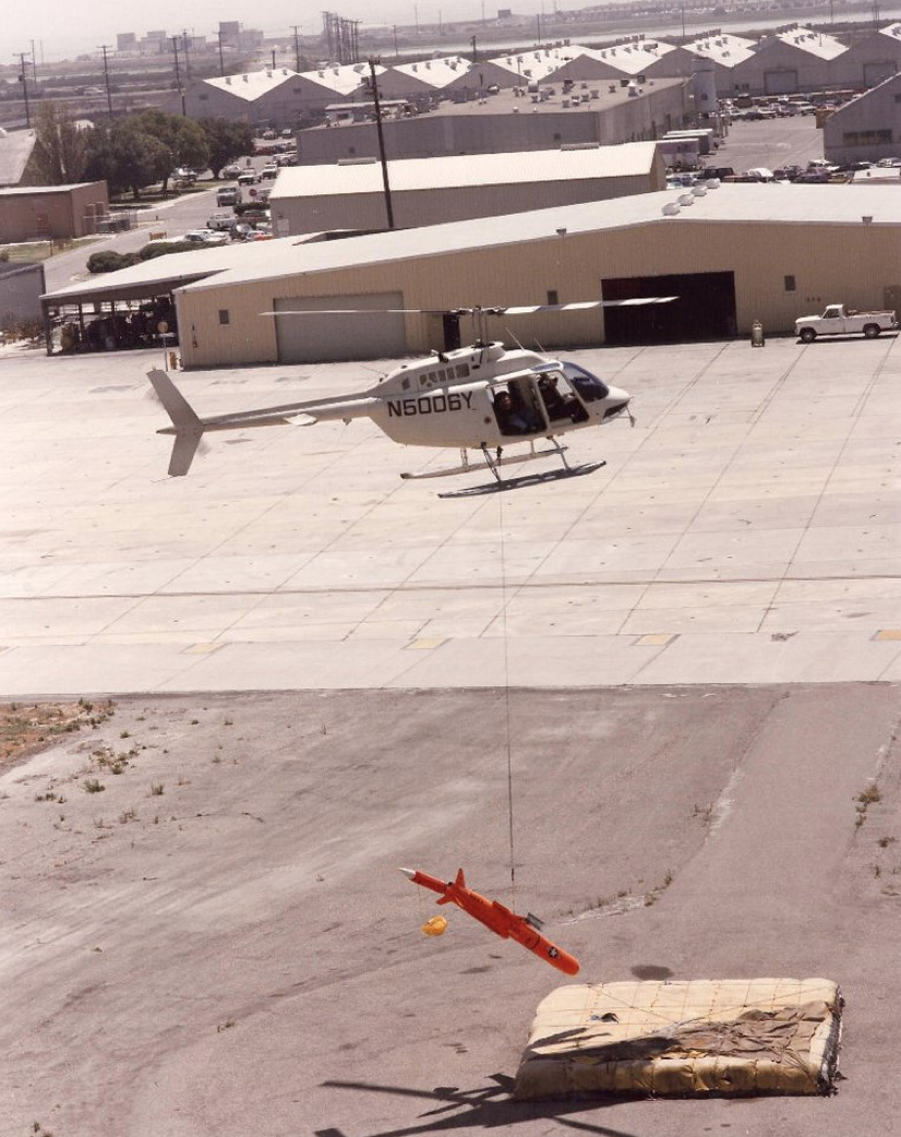 After recovering a BQM-74 drone from teh Pacific Ocean, it is dropped off at NTD to be readied for its next flight. Jerry Boyle flew this helicopter, Bell 206B-3 JetRanger N5006Y, on the San Carlos Apache Reservation, Arizona. (U.S. Navy)