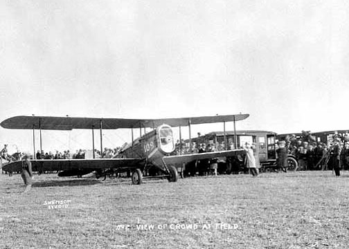 Robertson Aircraft Corporation Dh-4 No. 109. The airplane's fuselage is painted "Tuscan Red" and the wings and tail surafces are silver. The lettering on the side is white. (Minnesota Historical Society)