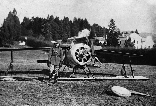 Major William G. Barker, RAF, with an upside-down Sopwith Camel F.1 of No. 28 Squadron, Italy, 1918. (Library and Archives Canada)