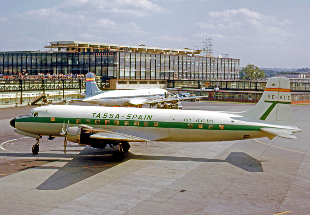 XC-112A was operated as a DC-6, EC-AUC, by TASSA Air Charter, seen here at London Gatwick, 29 August 1964. (RuthAS)