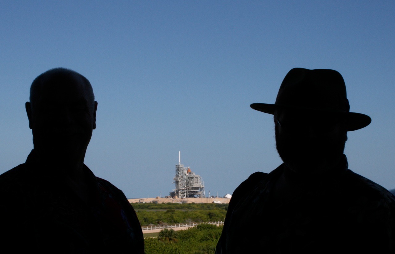 Your Blogger (left) and Site Administrator (right) observe preparations for the launch of Discovery (STS-133) from the Launch Complex 39 Viewing Gantry. (Photograph by unidentified fellow Observer)