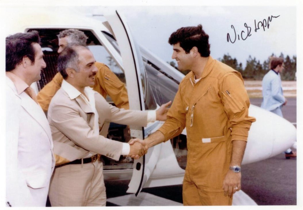 Test pilot Nick Lappos is congratulated following teh first flight of the Sikorsky S-76, 13 March 1977. (Photograph courtesy of Neil Corbett, Test and Research Pilots, Flight Test Engineers)