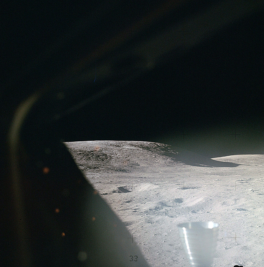 Teh surface of the Moon as seen through the window of the Lunar Module, shortly after landing. (NASA)