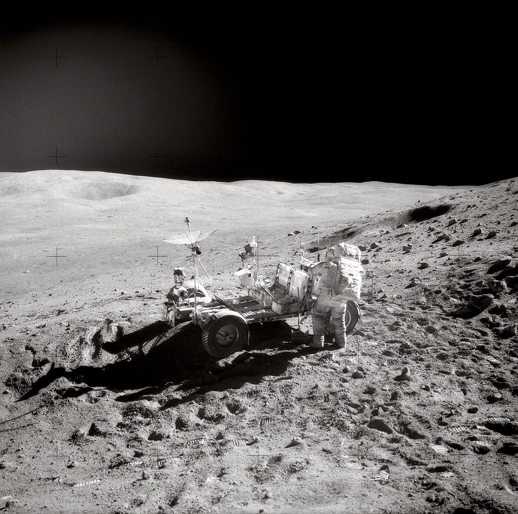 Looking northeast at John Young with the LRV, 22 April 1972. (Charles M. Duke, Jr./NASA)