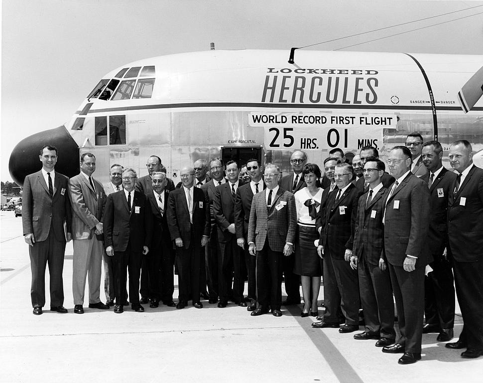 Lockheed personnel celbrate the 25 hour, 1 minute first flight of the commercial L100 Hercules. (Lockheed Martin)