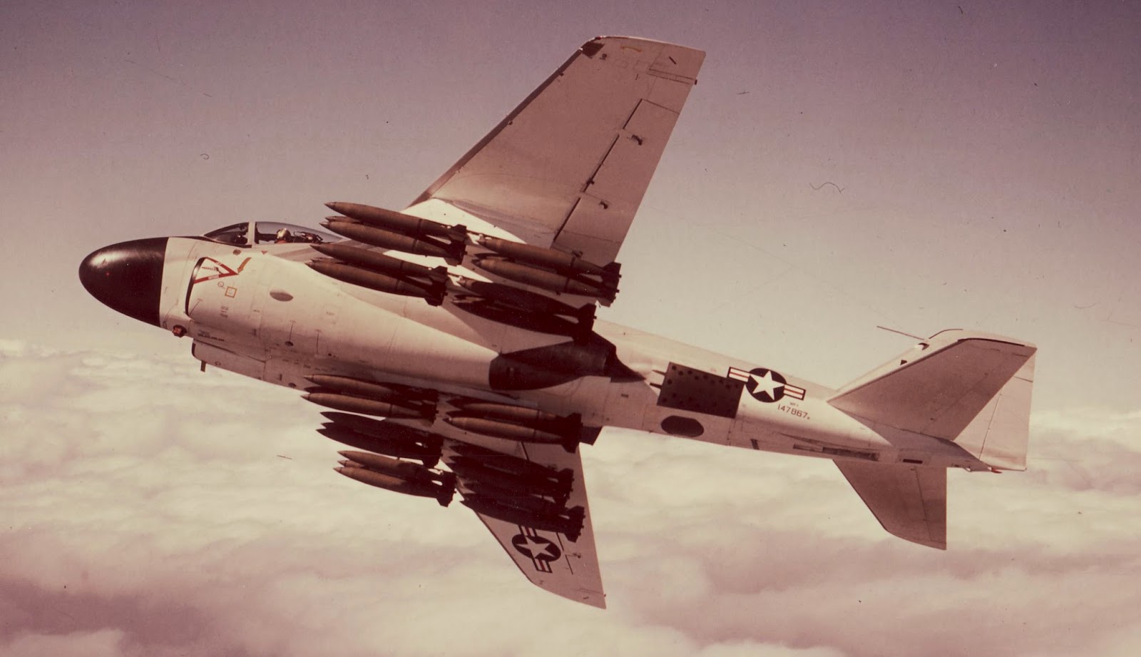 Grumman YA2F-1 (A-6A) Intruder Bu. No. 147867, the third prototype, carrying thirty Mk. 82 low-drag bombs on multiple ejector racks under the wings and fuselage. (U.S. Navy)