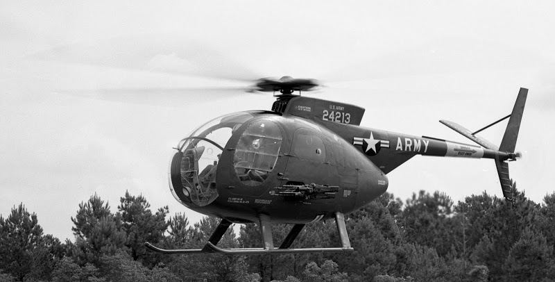 The third prototype YOH-6A, 62-4213, testing the XM-7 minigun. (U.S. Army)