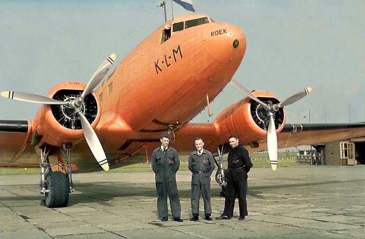 A KLM Douglas DC-3 at Luchthaven Schiplol, 1940. The airliner is conspicuously painted and marked in neutrality colors.