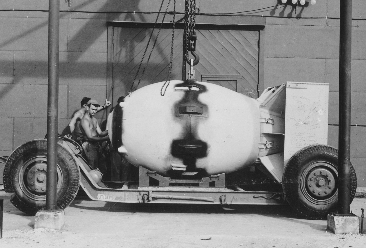 The Mark III "Fat Man" bomb loaded on its carrier, 8 August 1945.