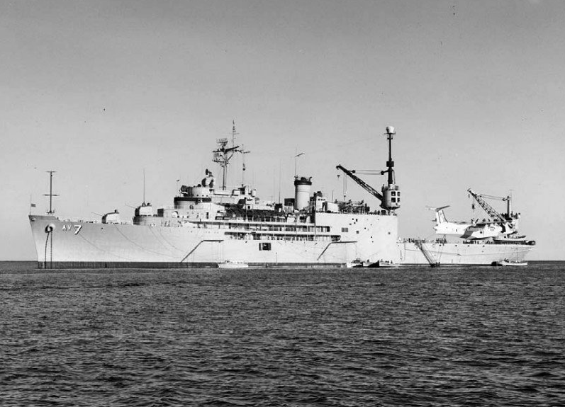 USS Currituck (AV-7) at anchor off Santa Catalina Island, California, 12 November 1964. The aircraft is a Martin P5M Mariner. (U.S. Navy)