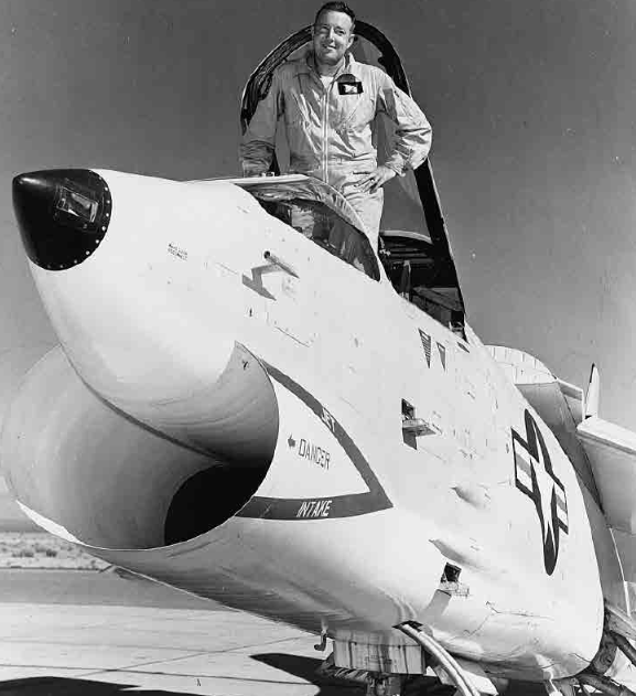 Commander Robert W. "Dule" Windsor, Jr., stands in teh cockpit of teh record-setting Vought F8U-1 Crusader, Bu. No. 141345. (U.S. Navy)