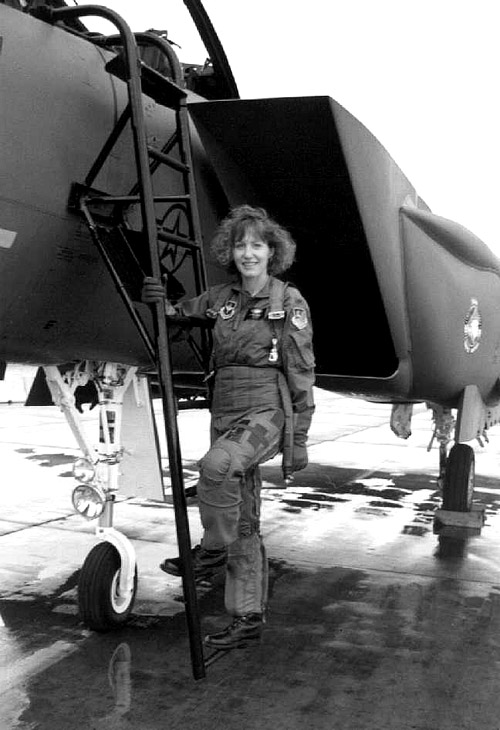First Lieutenant Jean Marie Flynn, USAF, call sign "Tally", with her McDonnell Douglas F-15E Strike Eagle. (U.S. Air Force)