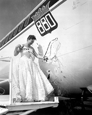 Miss San Diego, Leona McCurdy, christens Convair 880 Delta Queen with river water collected from around the Delta Air Lines system. (Delta)
