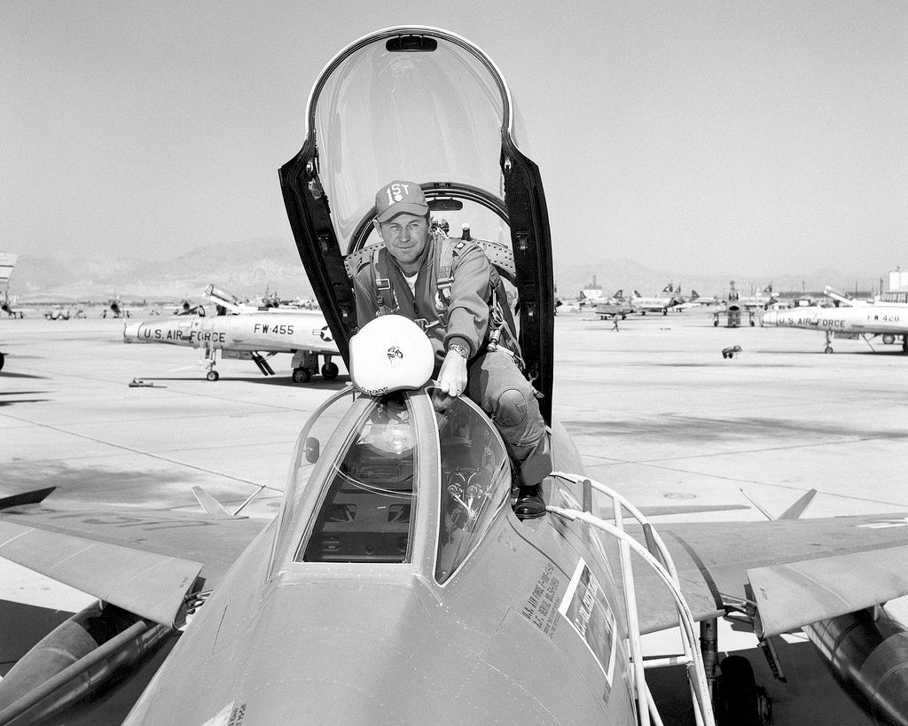 Lieutenant Colonel Charles E. Yeager, USAF, 1st Fighter Day Squadron, with North American Aviation F-100F-15-NA Super Sabre, 56-3950, George Air Force Base, California, 1958. (U.S. Air Force)