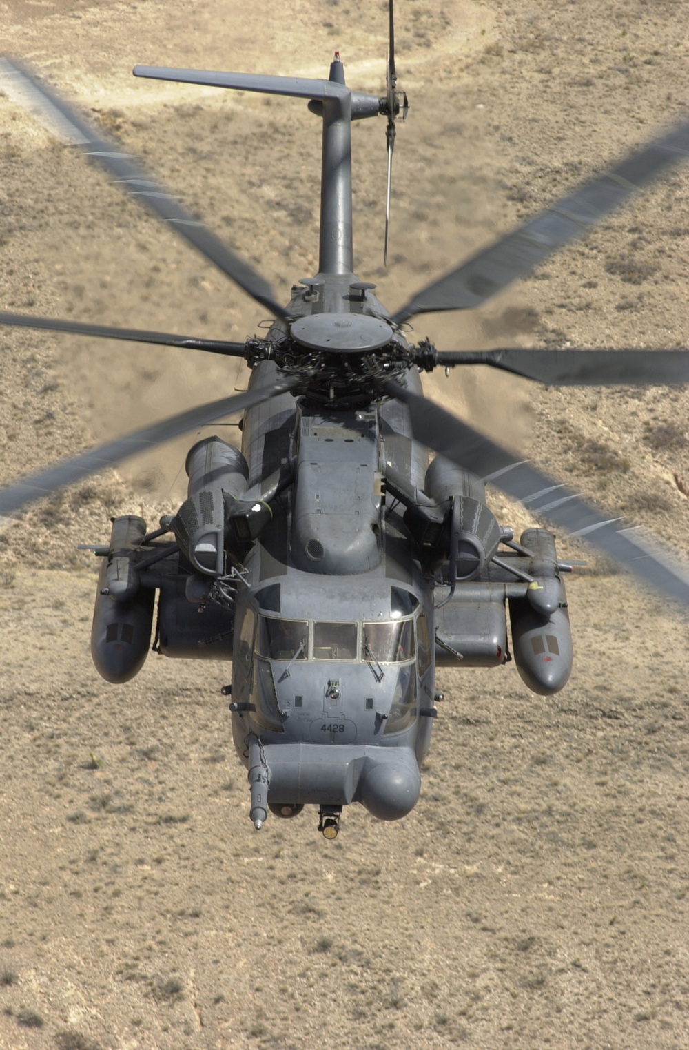 The first super Jolly Green Giant, 66-14428, now upgraded to an MH-53J Pave Low IIIE, assigned to the 551st Special operations Squadron, 58th Speciqal operations Wing, in flight near Kirtland Air Force Base, New Mexico, 24 March 2000. (U.S. Air Force)