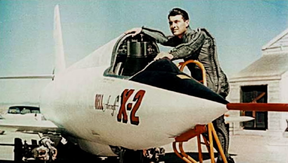 Lieutenant Colonel Frank K. Everest, U.S. Air Force, with a Bell X-2 at Edwards Air Force Base. Colonel Everest is wearing a capstan-type partial pressure suit for protection at very high altitude. (U.S. Air Force)