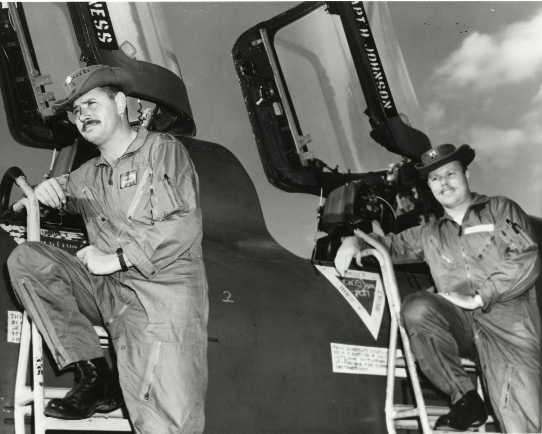 Major Leo K. Thorsness and Captain Harold E. Johnson with their Republic F-105F Thunderchief, Takhli Royal Thai Air Force Base, Thailand, 1967. (U.S. Air Force)