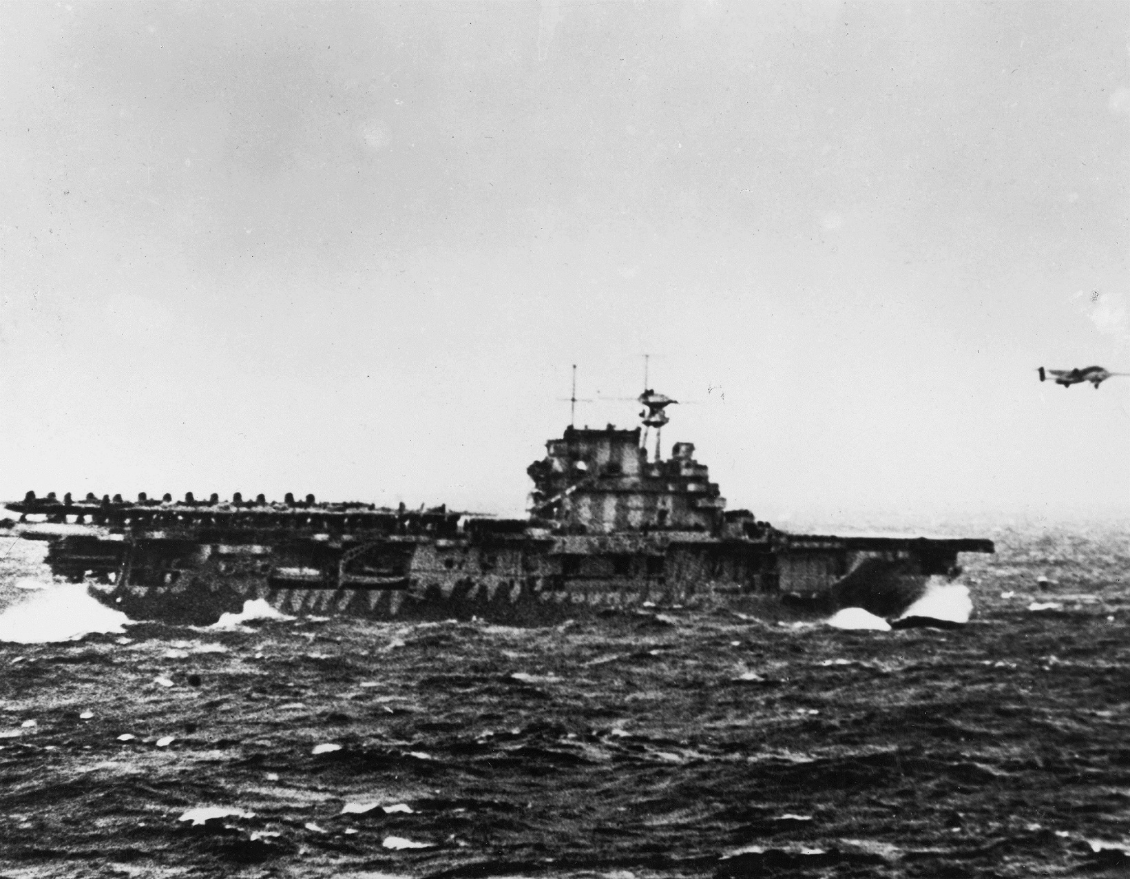 Lieutenant Colonel James H. ("Jimmy") Doolittle, U.S. Army Air Corps, flies a North American Aviation B-25B Mitchell medium bomber off the deck of USS Hornet (CV-8), 18 April 1942. (U.S. Navy)