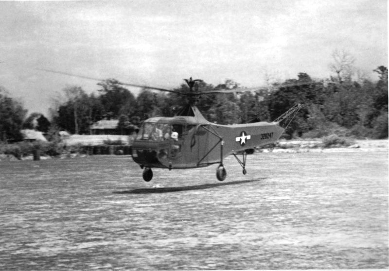 Lt. Carter Harman hovering in ground effect with Sikorsky YR-4B Hoverfly 43-28247 at Lalaghat, India, March 1944. This is the helicopter with which he made the first combat rescue, 21–25 April 1944. (U.S. Air Force)