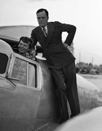 Amelia Earhart, in the cockpit of her Electra, with George Palmer Putnam, at Miami, 1 June 1937. (Wichita Eagle/Associated Press)