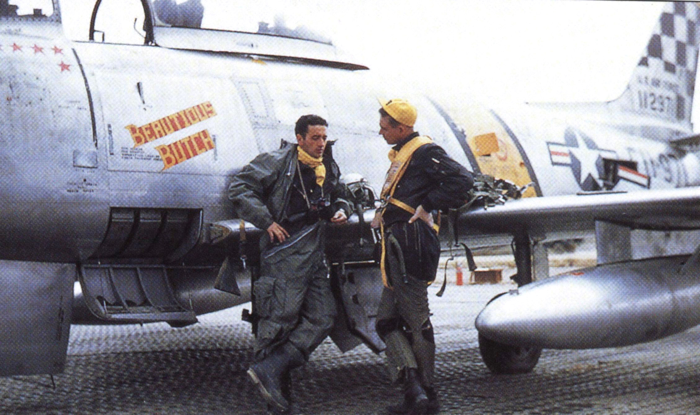 Captain Joseph C. McConnell, Jr., and Captain Harold Fischer, a double ace, with McConnell's second Sabre, F-86F-15-NA 51-12971, Korea, 1953. (U.S. Air Force). 