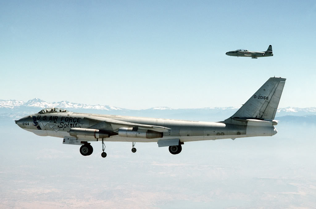 B-47E-25-DT Stratojet 52-166 enroute Castle Air Force Base with a Lockheed T-33A Shooting Star chase. California’s Sierra Nevada Mountains are in the distance. (TSGT Michael Hagerty/U.S. Air Force)