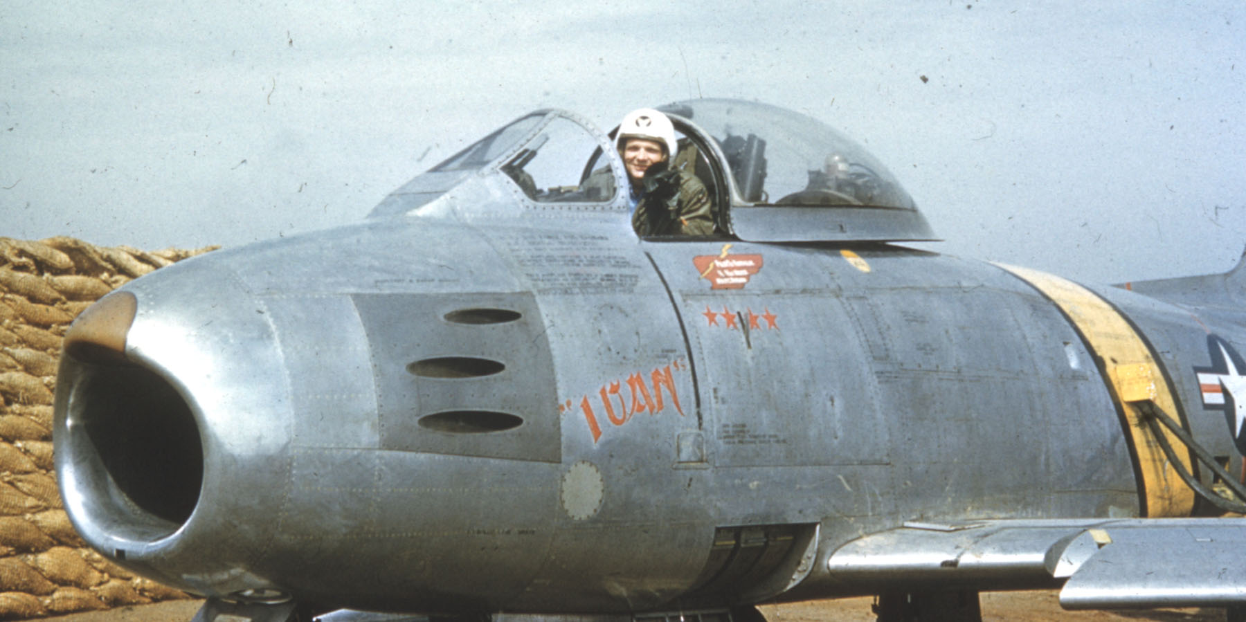 Lieutenant Iven C. Kincheloe, Jr., in the cockpit of his North American Aviation F-86F-10-NA Sabre, 51-2731, named Ivan. (U.S. Air Force) 