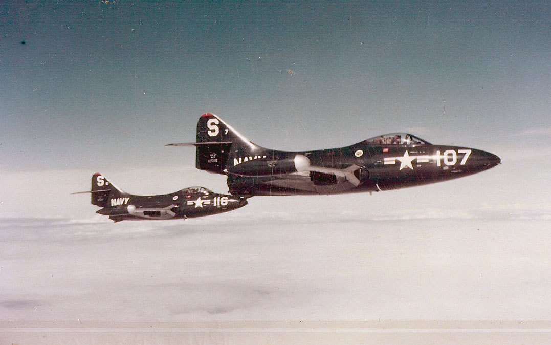 Ensign Neil A. Armstrong, as wingman to Lieutenant (j.g.) Ernie Moore, is flying the second Grumman F9F-2 Panther, Bu. No. 125122 (marked S 116), assigned to VF-51, USS Essex (CV-9), 1951. (Naval Aviation Museum)