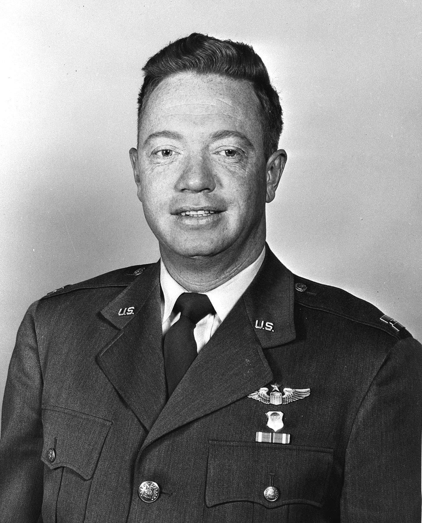 Captain Joseph W. Kitinger, United States Air Force. Captain Kittinger is wearing the wings of an Air Force Senior Pilot and an Air Force Basic Parachutist Badge. The red, white and blue striped ribbon represents the Distinguished Flying Cross. (U.S. Air Force)